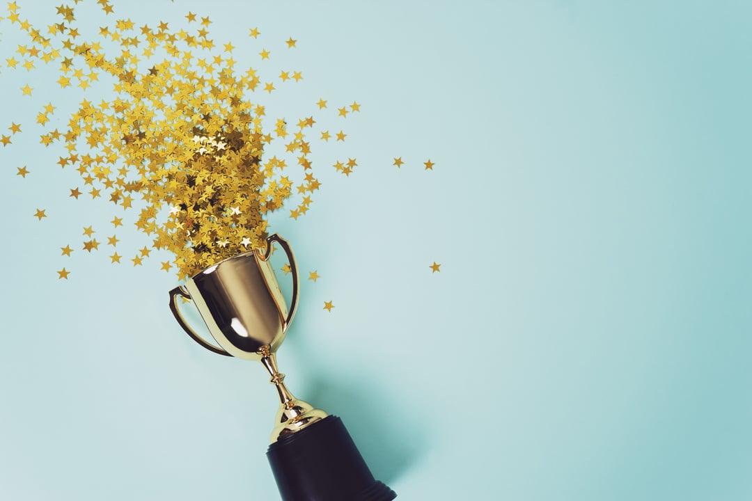 gold winner cup on blue  background